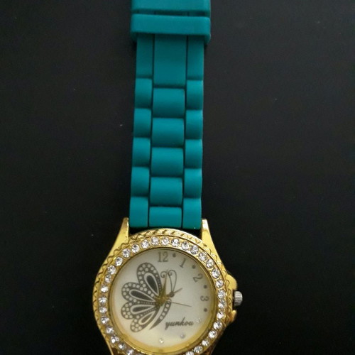 Women's round wristwatch with rhinestones used