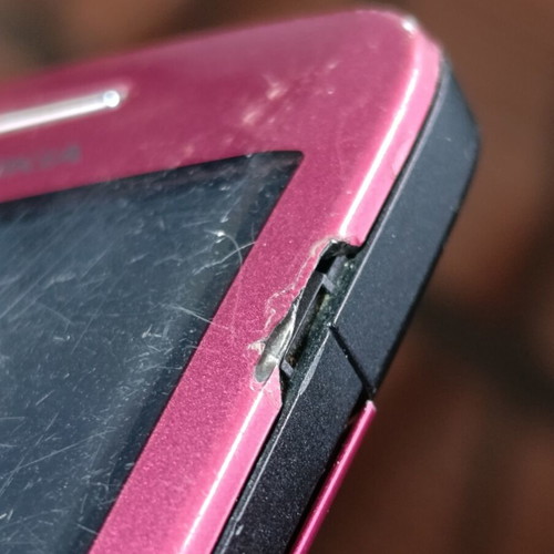 Nokia C3-00 used, pink mobile phone with QWERTY keyboard
