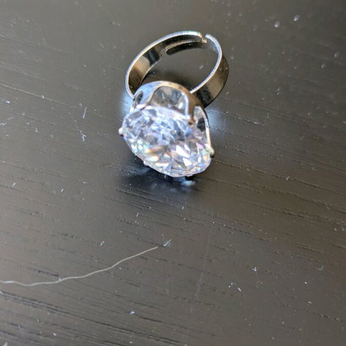 Silver ring like new with white transparent stone and adjustable size