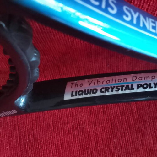 Lioquid Crystal Polymer 1998 rackets like new with case