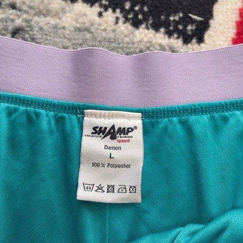 Shamp Women’s shorts Size L Running Training Teal Purple.