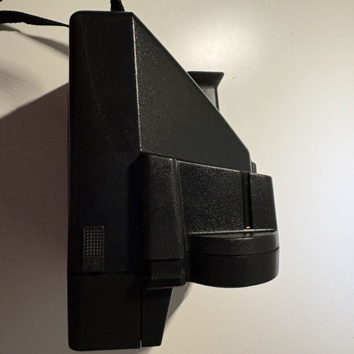 Polaroid Sonar AF 5000 instant camera with 8-frame film pack