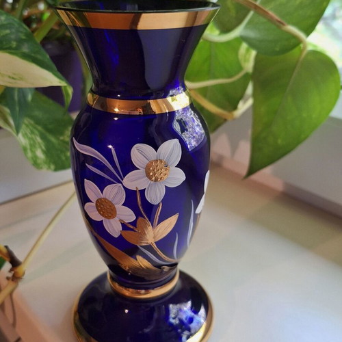 Blue vase with gold ornaments like new, solid glass