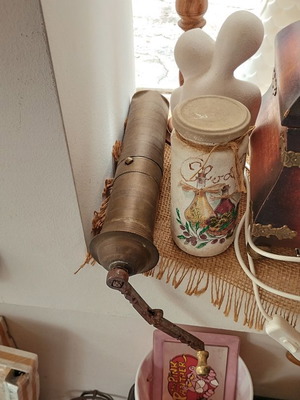 Old traditional brass manual coffee grinder used