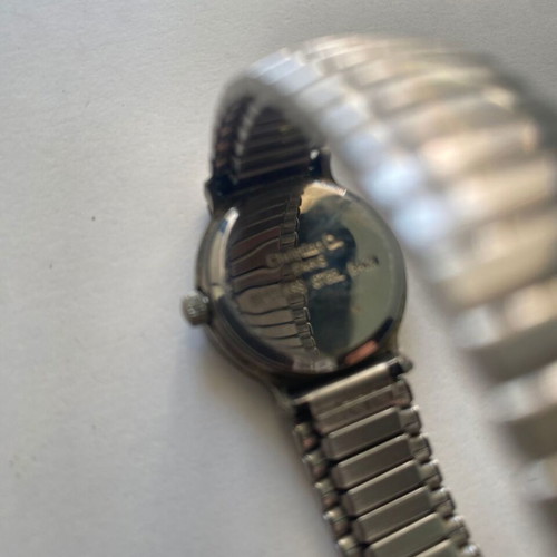 Christian D. Quartz women's watch used with stretch bracelet and retro charm