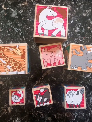 Melissa & Doug wooden nesting cubes used with animal theme