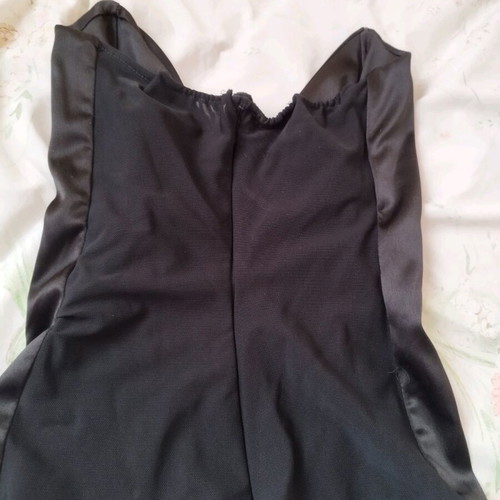Black corset used with pointed neckline and leather look, size XS