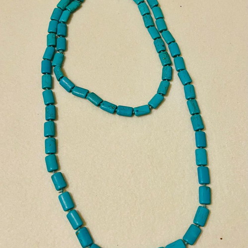 Long blue necklace used