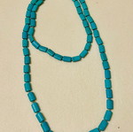 Long blue necklace used