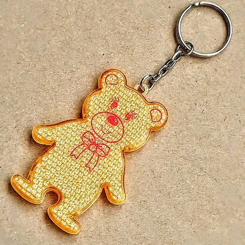 Reflective keychain Bear like new, yellow and orange