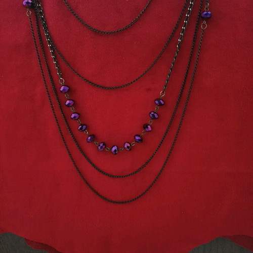 Long necklace new with black chains and purple crystals