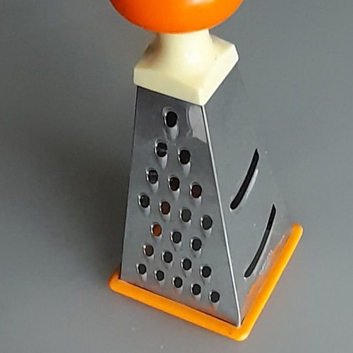 Cheese and vegetable grater used