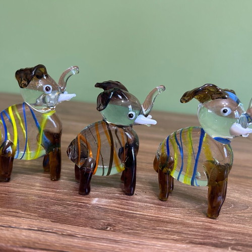 Set of three Murano style decorative glass elephants like new