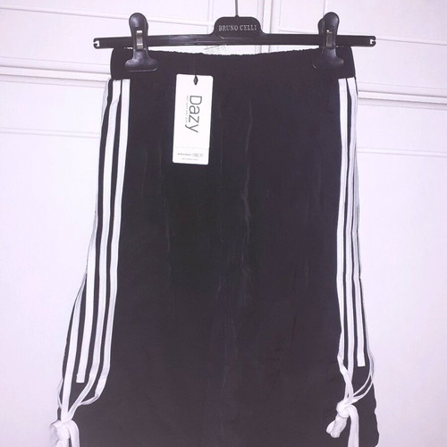 Black wide bermuda shorts new with striped design and cords