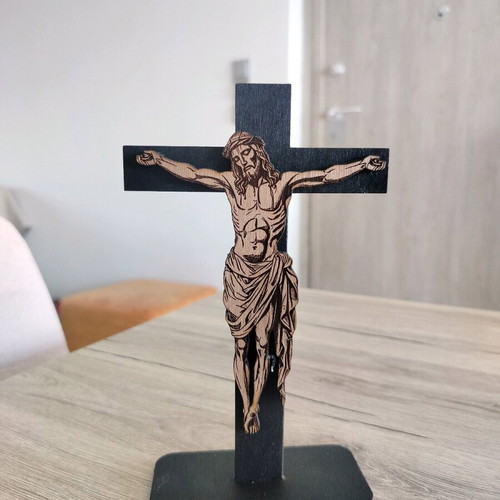 Handmade cross with embossed Jesus figure on laser cut wood