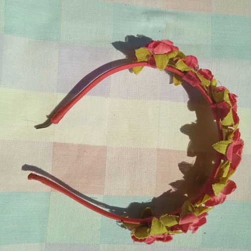 Children's tiara used with pink and green roses
