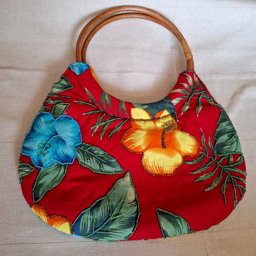 Handbag like new with wooden handle and colorful floral design