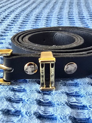 Black belt with gold buckle, size 105