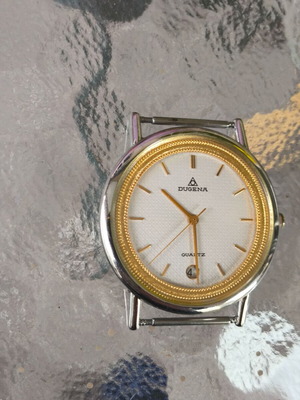 Dugena men's quartz watch like new with gold bezel