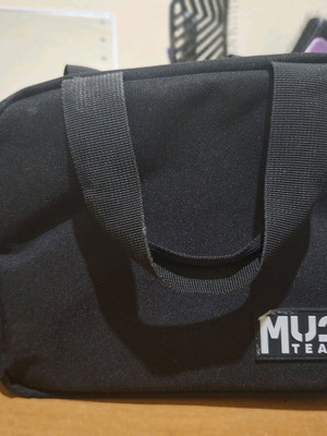Must Team insulated lunch bag used, black