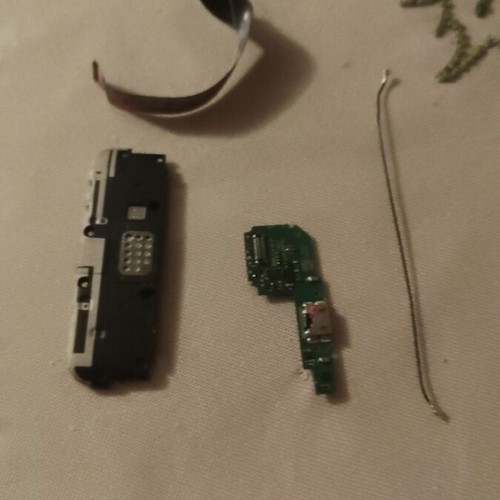 Redmi 6A charging port with antenna cable and speaker