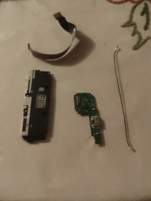 Redmi 6A charging port with antenna cable and speaker