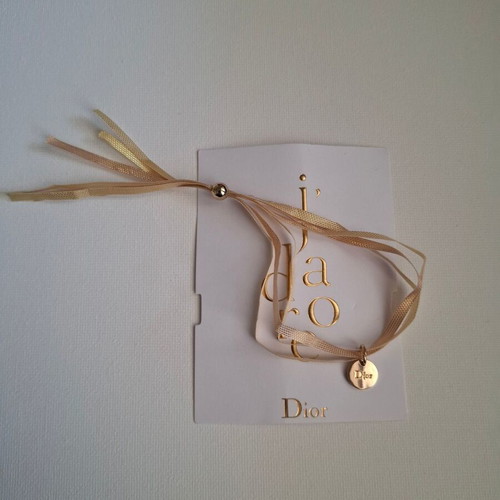 Dior bracelet with charm and adjustable ribbon new, gold and beige