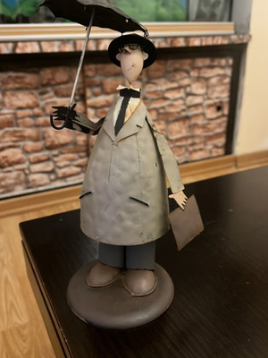 Metal figurine Mr. with umbrella vintage, used