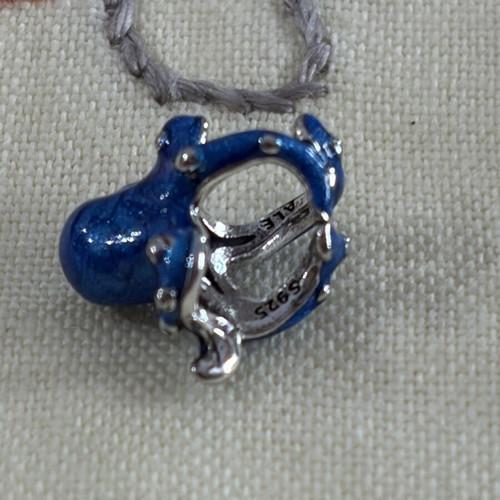 Octopus charm symbol