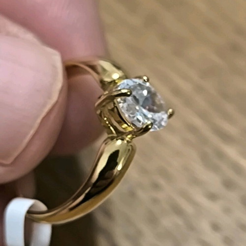 Gold ring with white crystal stone new, size 8
