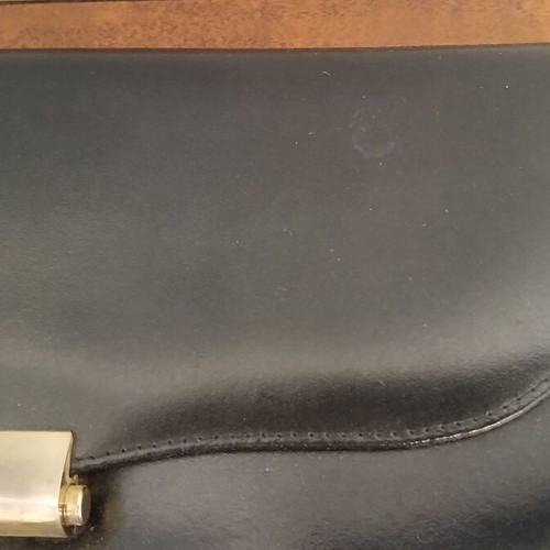 Envelope bag black genuine leather 14x28 cm used with plastic paint stain