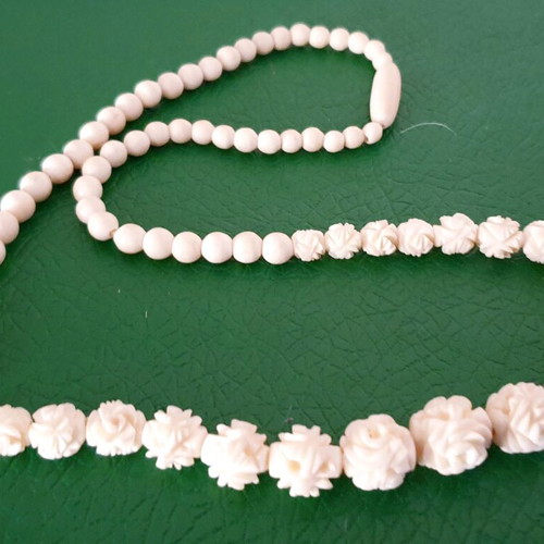 Vintage carved bone necklace with rose details