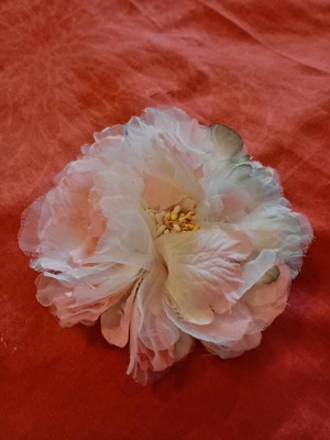00s boutonniere like new, salmon-pink with green touches