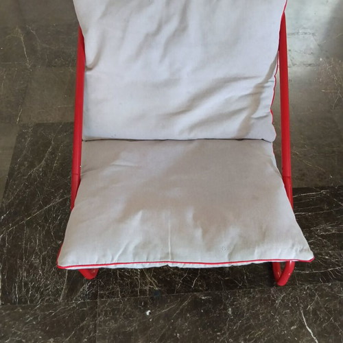 Outdoor and indoor armchair with cushions used