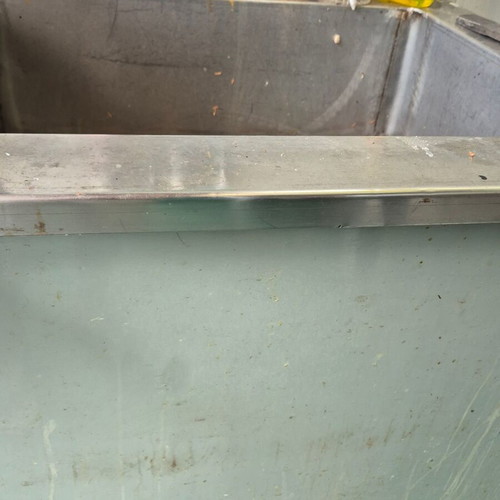 Stainless steel tables and sinks for restaurants used