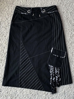 Midi asymmetrical black skirt used, with pocket, size 38