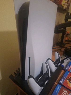 PS5 825GB Disc Edition with 2 controllers and charging cooling stand