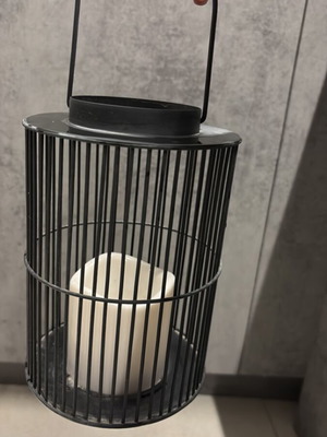 Modern decorative lantern used with metal grid design