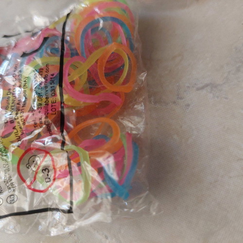 Colored Hair Elastics new, in sealed bags