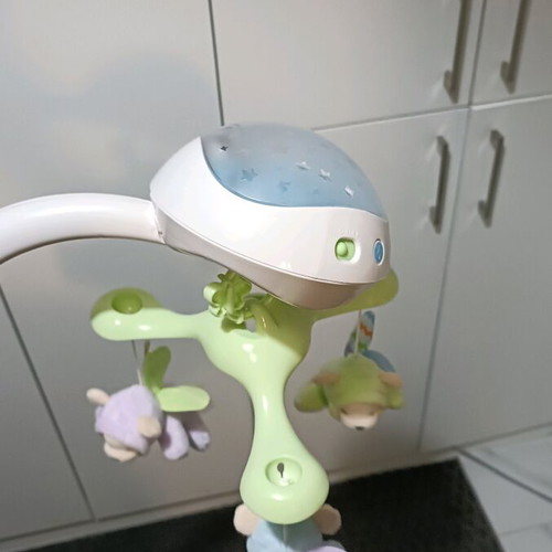 Fisher Price rotating crib toy like new with sounds and star projector