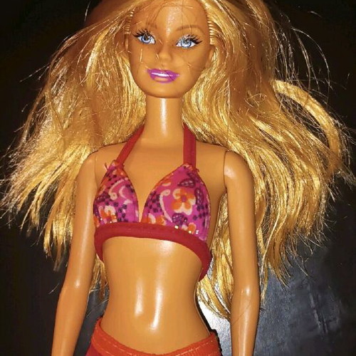 Barbie doll used with minor imperfections, authentic outfit