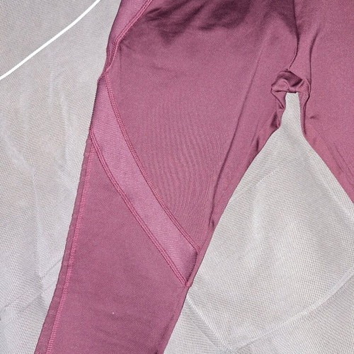 Women's leggings Bordeaux Oysho size Medium like new with mesh panels and zipper pocket