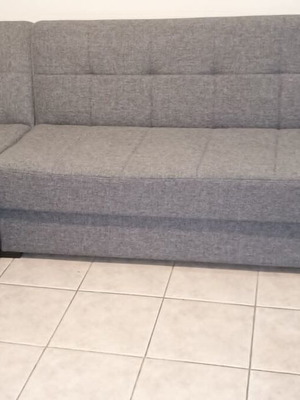 Sofa bed with storage space like new, dark gray