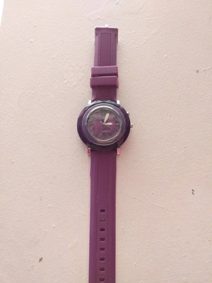 Purple wristwatch used, women's