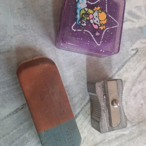 Vintage sharpener and erasers used, set