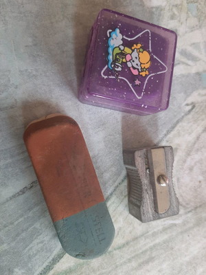 Vintage sharpener and erasers used, set