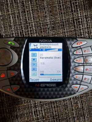 Nokia N-Gage used, functional with charger, broken buttons, faulty microphone