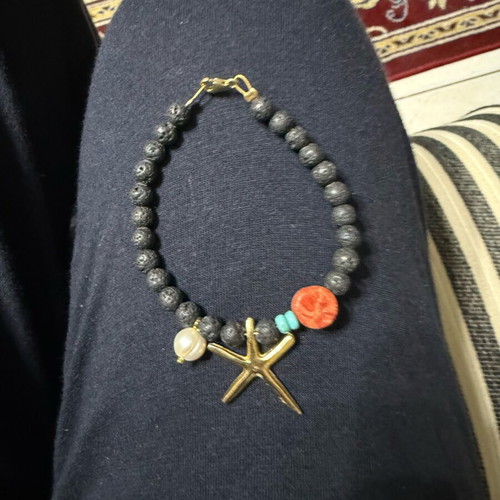 Bracelets set used, two with starfish and double design