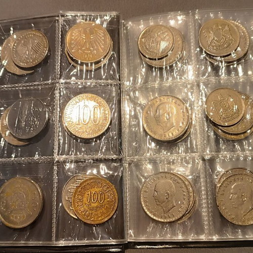 Album of 60 collectible coins