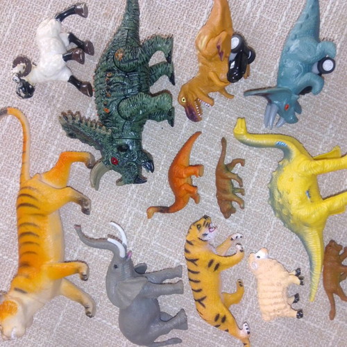 Set of dinosaur and wild animal figures like new